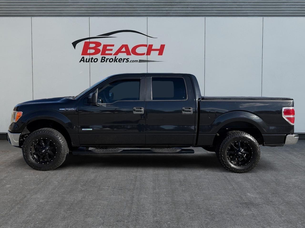 2014 Ford F-150 XLT, TOW HOOKS, TOW PACKAGE, AUX, BLUETOOTH, POWER MIRRORS, TONNEAU COVER, 4X4, BLACK WHEELS, KEYLESS ENTRY, COME AND TEST DRIVE THIS FORD F-150 TODAY! Norfolk VA