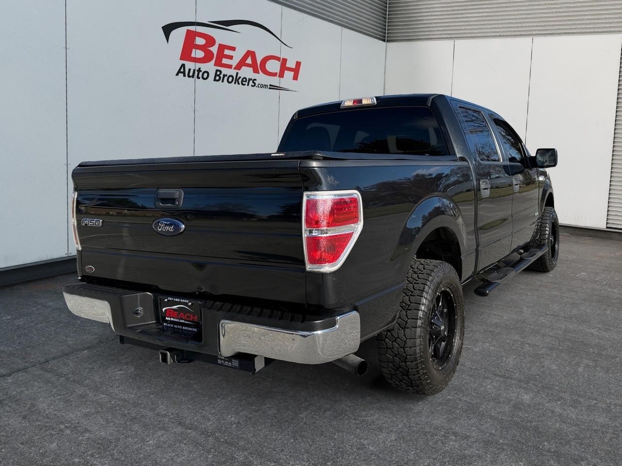 2014 Ford F-150 XLT, TOW HOOKS, TOW PACKAGE, AUX, BLUETOOTH, POWER MIRRORS, TONNEAU COVER, 4X4, BLACK WHEELS, KEYLESS ENTRY, COME AND TEST DRIVE THIS FORD F-150 TODAY! Norfolk VA