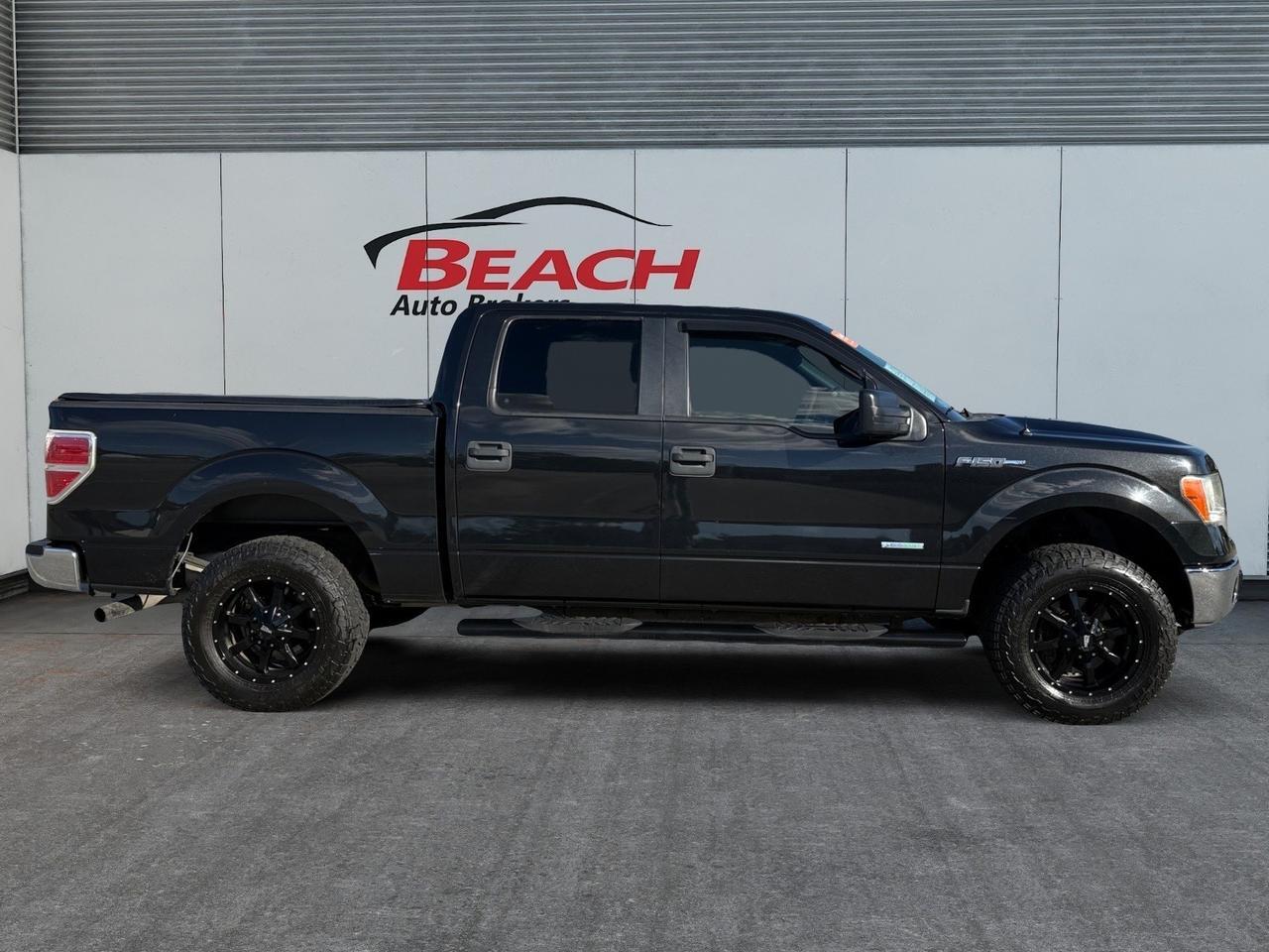 2014 Ford F-150 XLT, TOW HOOKS, TOW PACKAGE, AUX, BLUETOOTH, POWER MIRRORS, TONNEAU COVER, 4X4, BLACK WHEELS, KEYLESS ENTRY, COME AND TEST DRIVE THIS FORD F-150 TODAY! Norfolk VA