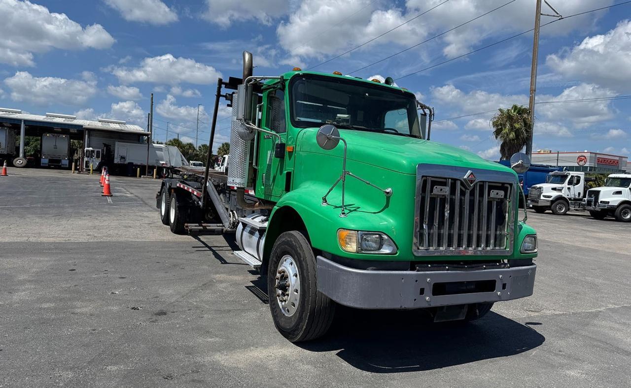 2014 International Paystar 60,000 lb. Heil Dual Lift Roll-off Truck