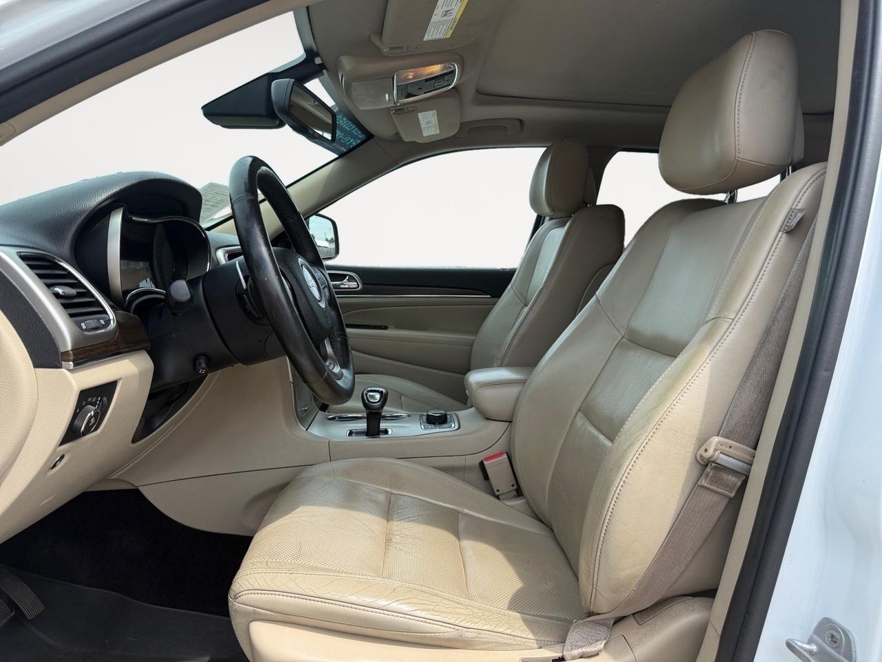 2014 Jeep Grand Cherokee Limited, HEATED/VENTILATED SEATS, HEATED REAR SEATS, MOONROOF, POWER LIFTGATE, UNIVERSAL GARAGE DOOR OPENER, BLUETOOTH, BACKUP CAMERA, POWER/HEATED MIRRORS, REMOTE START, NAVIGATION, PERFECT SPACE FO THE KIDS WHILE STILL LUXURIOS FOR THE PARENTS!