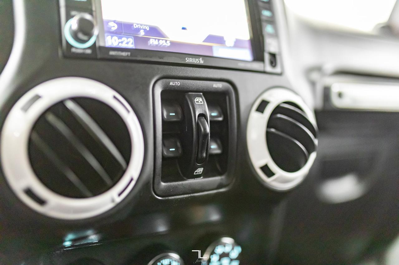 2014 Jeep Wrangler Unlimited 4x4 Sahara Polar Edition Leather Nav Fuel Wheels Red Deer AB