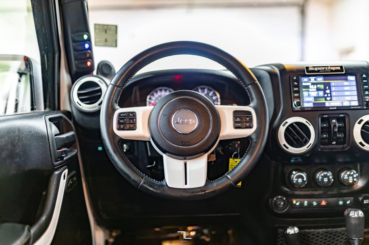 2014 Jeep Wrangler Unlimited 4x4 Sahara Polar Edition Leather Nav Fuel Wheels Red Deer AB