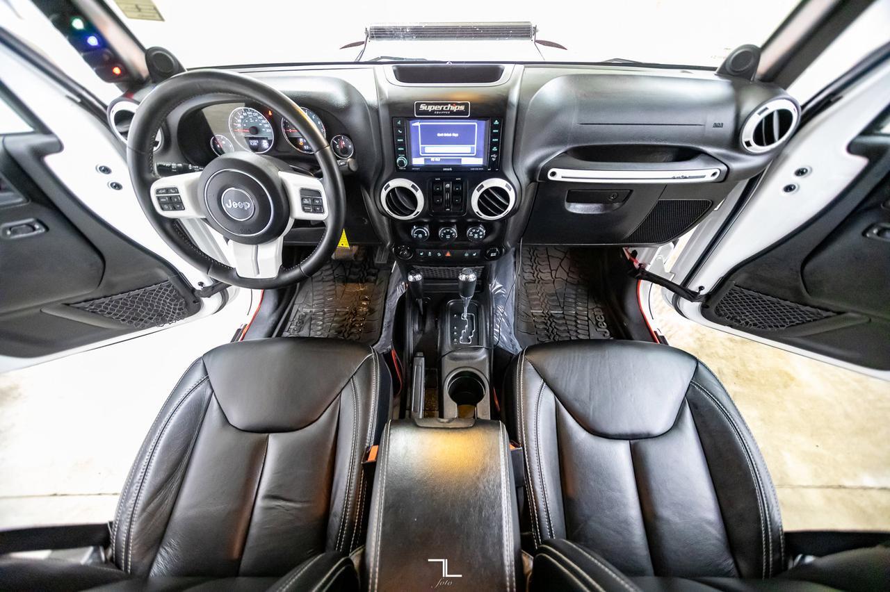 2014 Jeep Wrangler Unlimited 4x4 Sahara Polar Edition Leather Nav Fuel Wheels Red Deer AB