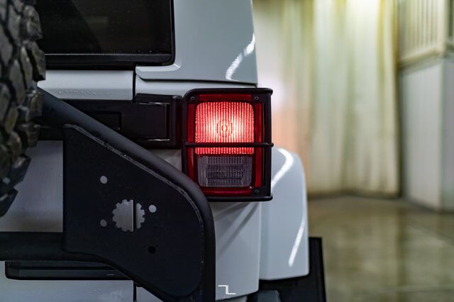 2014 Jeep Wrangler Unlimited 4x4 Sahara Polar Edition Leather Nav Fuel Wheels Red Deer AB