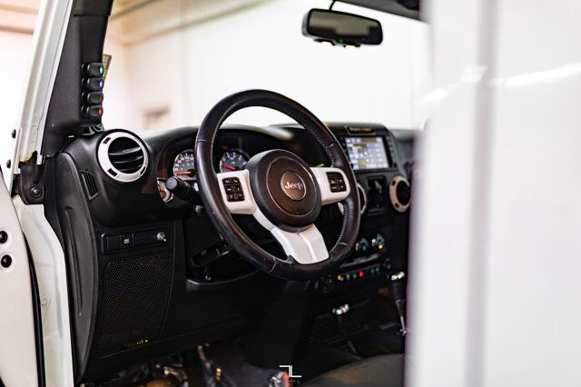 2014 Jeep Wrangler Unlimited 4x4 Sahara Polar Edition Leather Nav Fuel Wheels Red Deer AB