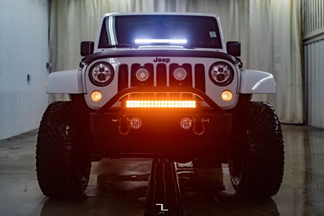 2014 Jeep Wrangler Unlimited 4x4 Sahara Polar Edition Leather Nav Fuel Wheels Red Deer AB