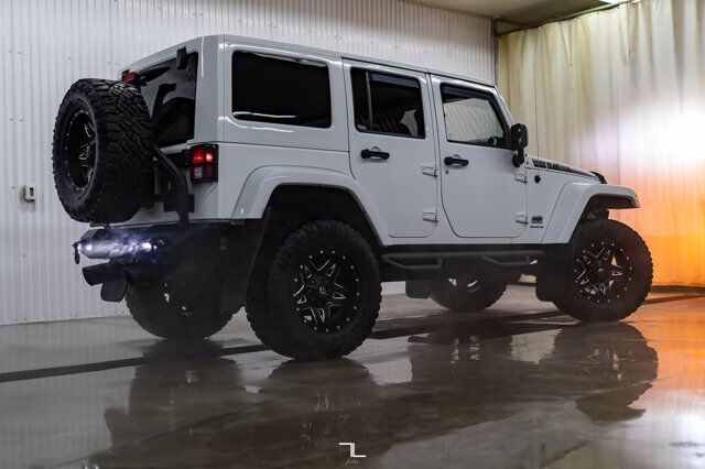 2014 Jeep Wrangler Unlimited 4x4 Sahara Polar Edition Leather Nav Fuel Wheels Red Deer AB
