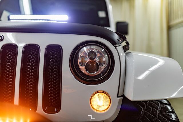 2014 Jeep Wrangler Unlimited 4x4 Sahara Polar Edition Leather Nav Fuel Wheels Red Deer AB