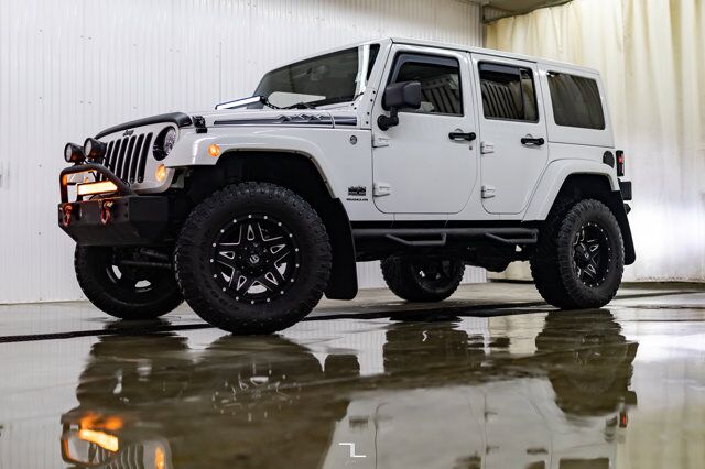 2014 Jeep Wrangler Unlimited 4x4 Sahara Polar Edition Leather Nav Fuel Wheels Red Deer AB