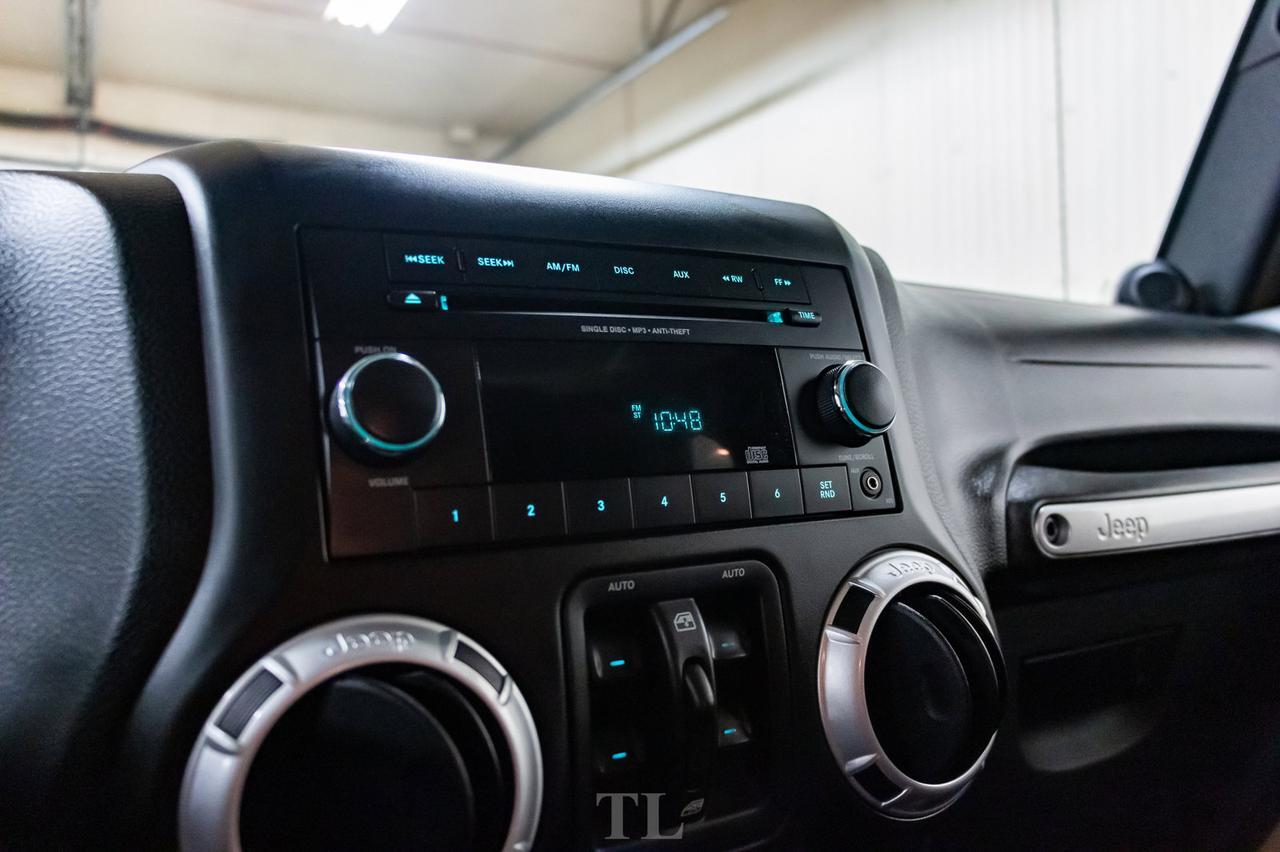 2014 Jeep Wrangler Unlimited 4x4 Sahara Red Deer AB