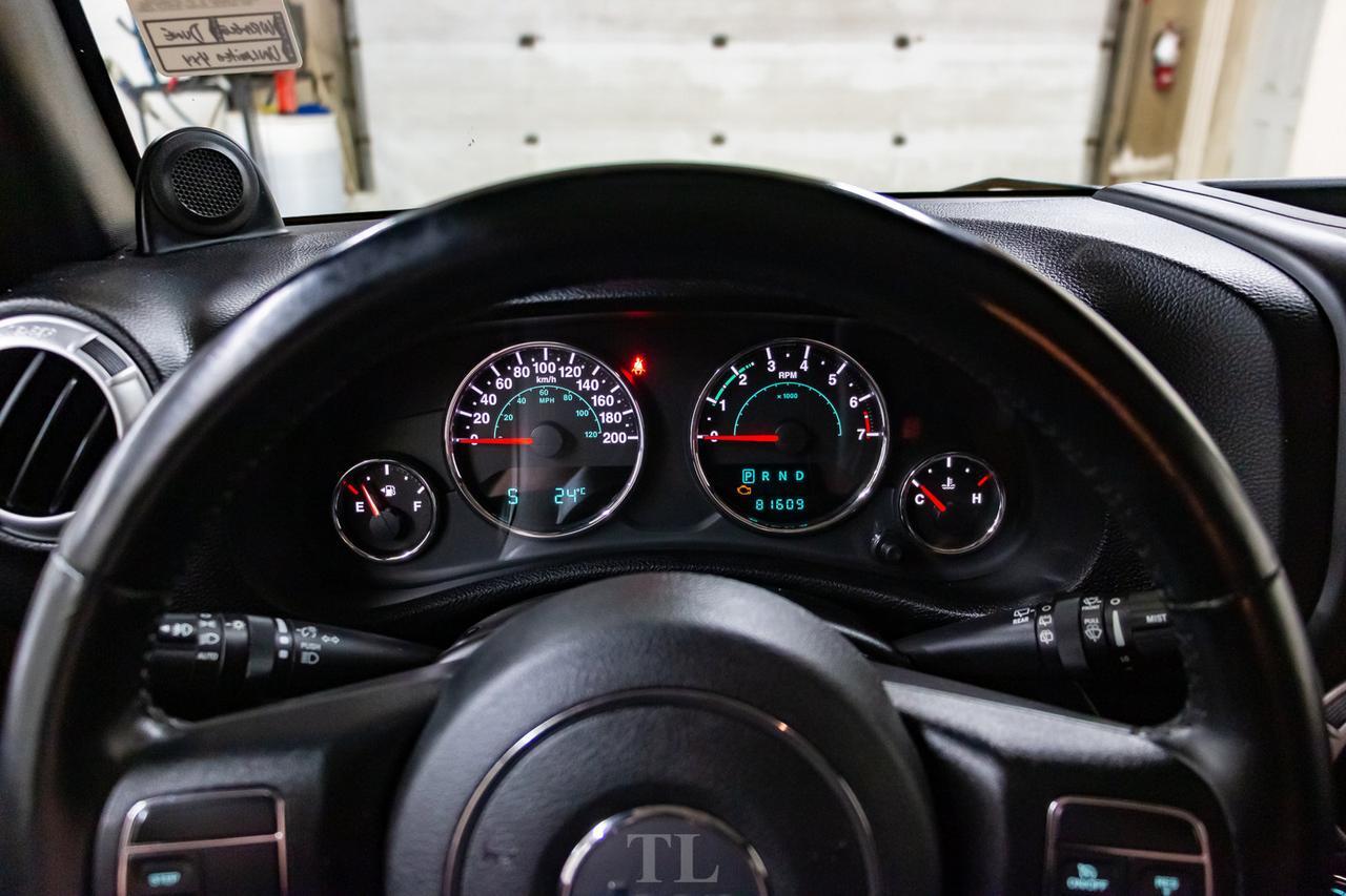 2014 Jeep Wrangler Unlimited 4x4 Sahara Red Deer AB