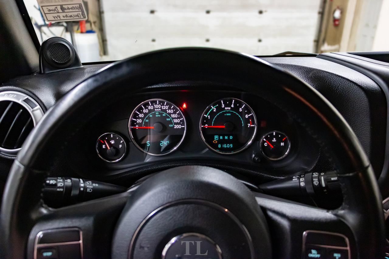 2014 Jeep Wrangler Unlimited 4x4 Sahara Red Deer AB