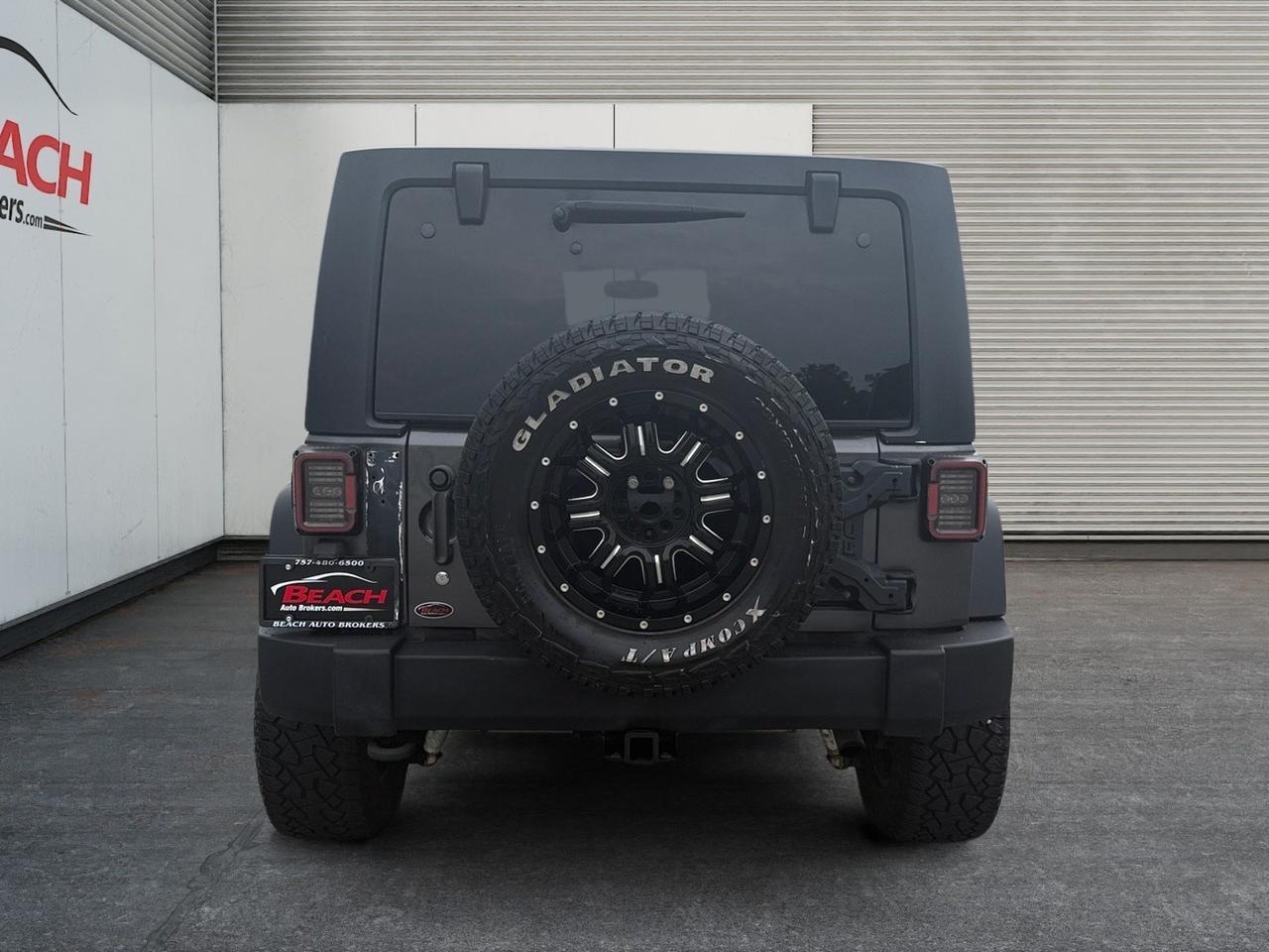 2014 Jeep Wrangler Unlimited Rubicon, HEATED SEATS, BLUETOOTH, RUNNING BOARDS, TOW PACKAGE, FENDER FLARES, POWER/HEATED MIRRORS, KEYLESS ENTRY, TOW HOOKS, LOW MILES, THIS JEEP IS READY FOR ITS NEXT ADVENTURE! Norfolk VA