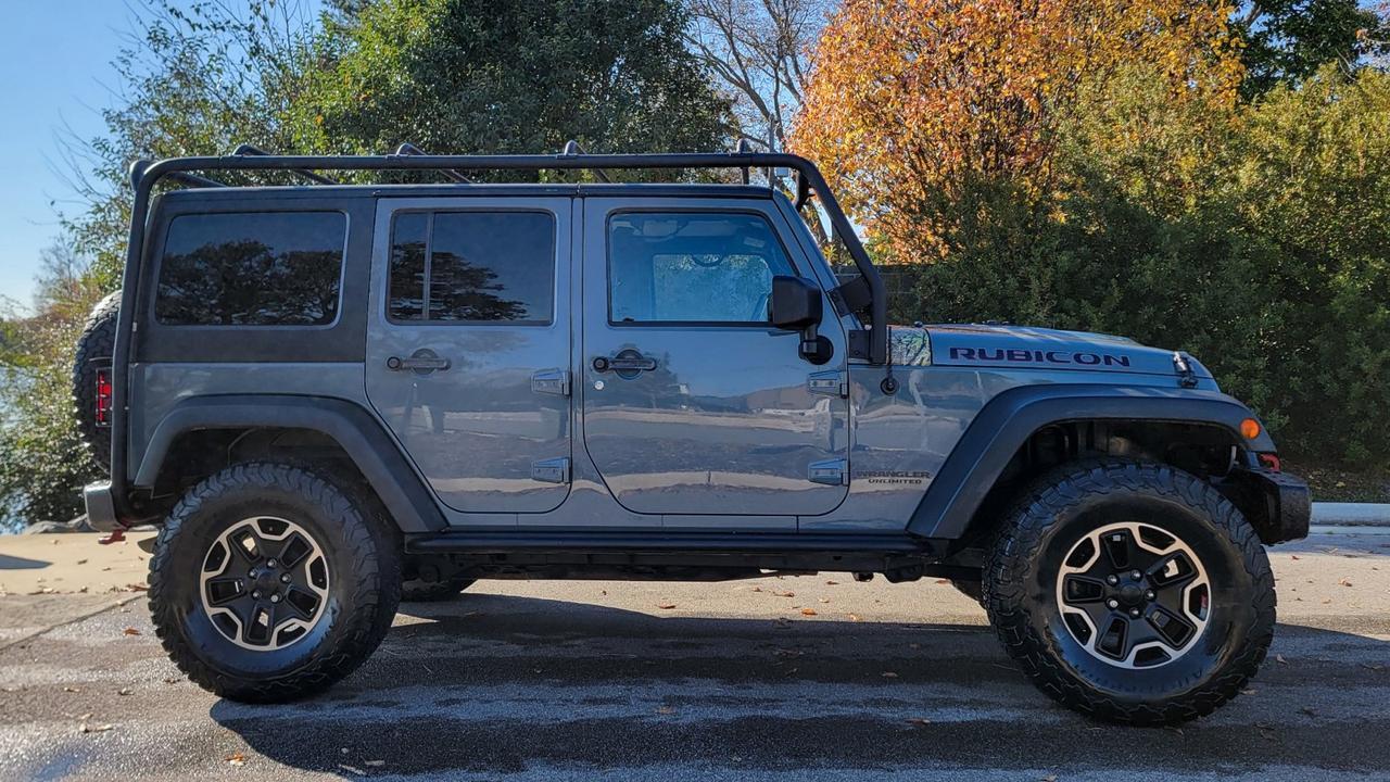 2014 Jeep Wrangler Unlimited Rubicon X 4 DOOR 4x4 WITH BARRICADE ROOF