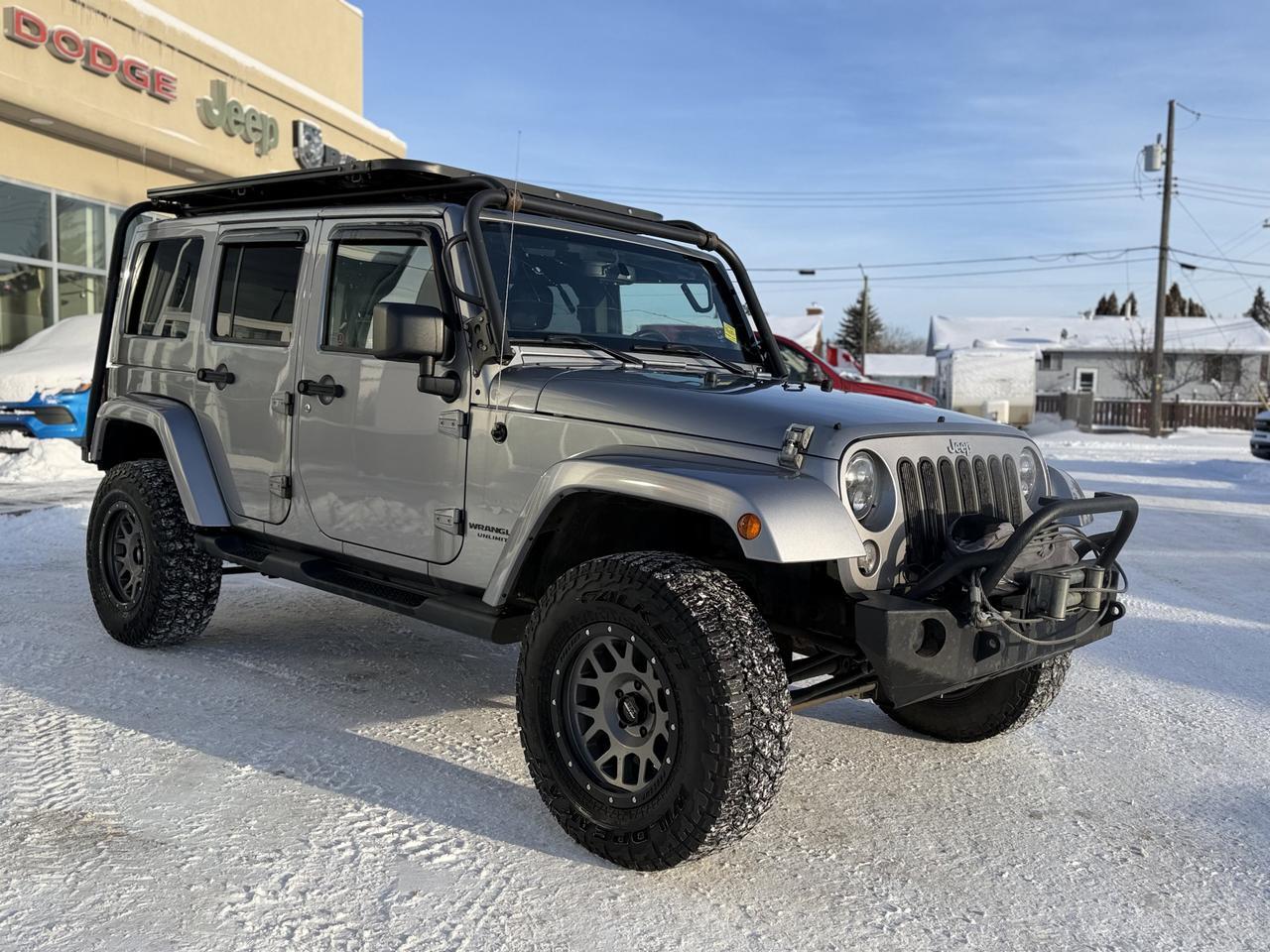 2014 Jeep Wrangler Unlimited Sahara | 2.5" Lift | Upgraded Bumpers | Rim & Tire Pkg | Overland Rack | One Owner Redwater AB