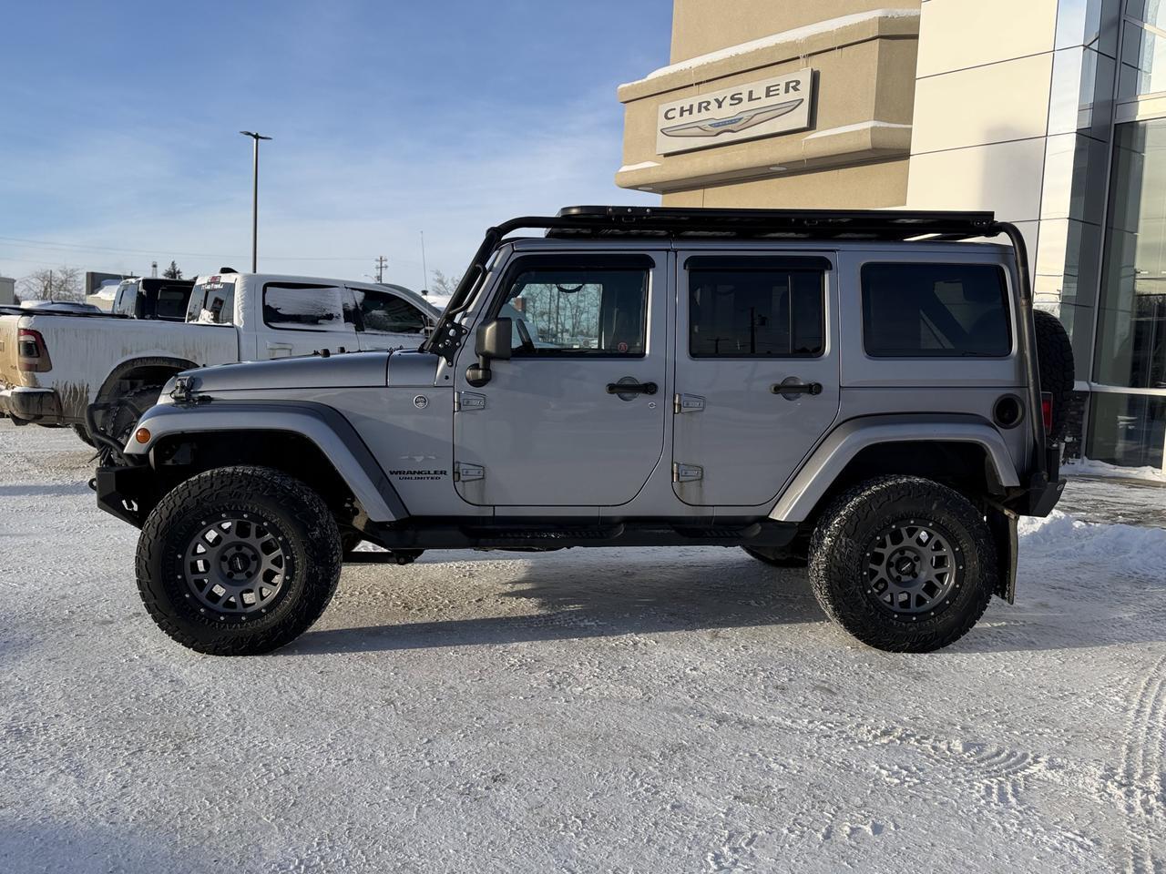 2014 Jeep Wrangler Unlimited Sahara | 2.5" Lift | Upgraded Bumpers | Rim & Tire Pkg | Overland Rack | One Owner Redwater AB