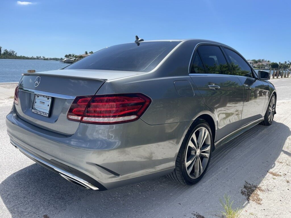 2014 Mercedes-Benz E-Class E 350 Sport~ACCIDENT AVOIDANCE SYSTEMS~APPROACH LIGHTS~BLIND SPOT WARNING~CHROME GRILLE~CRASH SENSORS~LEATHER SEATS~LUXURY PACKAGE~PARKING SENSORS~PREMIUM SOUND SYSTEM~VIDEO SYSTEM Sarasota FL