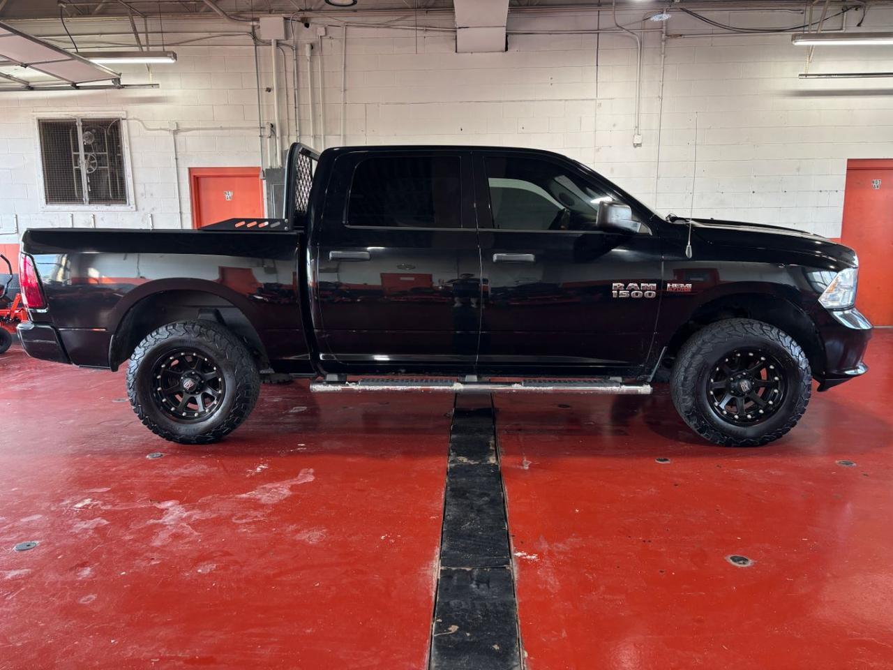 Black Clearcoat 2014 RAM 1500 Pickup Truck Four-Wheel Drive Automatic
