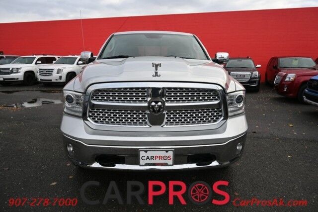 2014 Ram 1500 Laramie - 4x4 - Crew Cab - 5.7L HEMI V8 - Convenience and Protection Pkg - Heated & Cooled Leather Seats - Remote Start - Alpine Premium Sound - Backup Camera - Bed Rack - Bed Liner - Running Boards - Low Miles