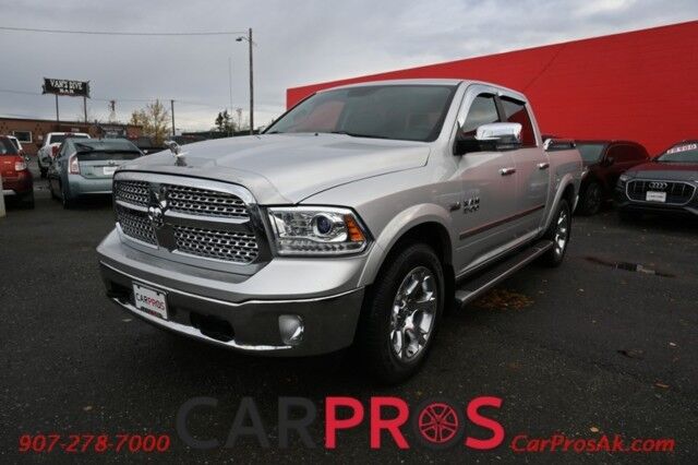 2014 Ram 1500 Laramie - 4x4 - Crew Cab - 5.7L HEMI V8 - Convenience and Protection Pkg - Heated & Cooled Leather Seats - Remote Start - Alpine Premium Sound - Backup Camera - Bed Rack - Bed Liner - Running Boards - Low Miles