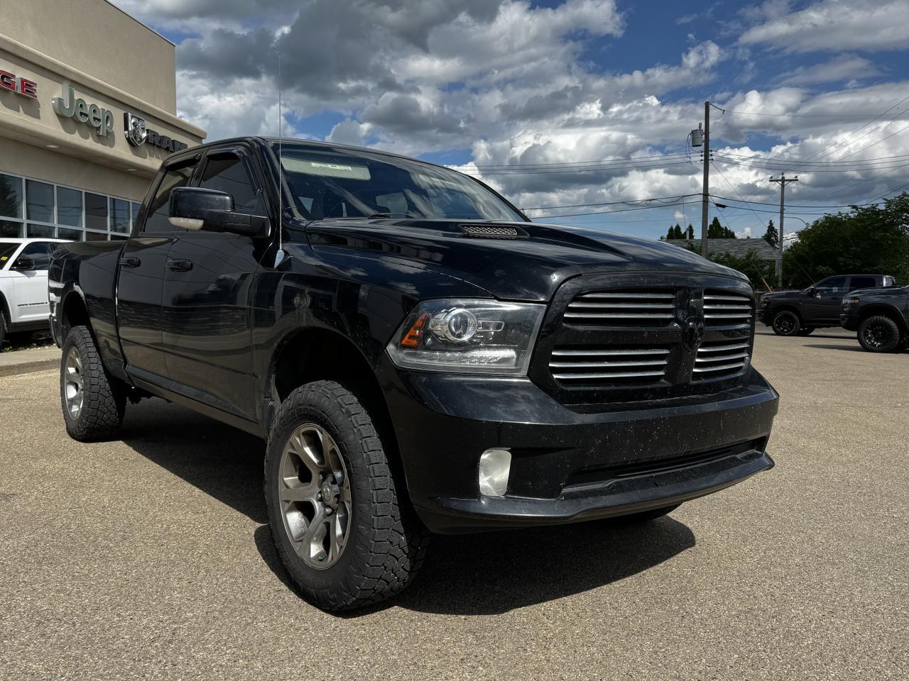 2014 Ram 1500 Sport Quad Cab 4x4 | Blowout Special | HEMI V8 | Backup Camera | Sunroof Redwater AB