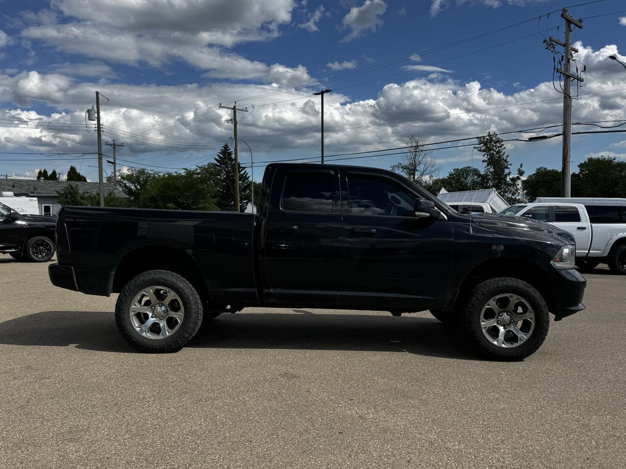 2014 Ram 1500 Sport Quad Cab 4x4 | Blowout Special | HEMI V8 | Backup Camera | Sunroof Redwater AB