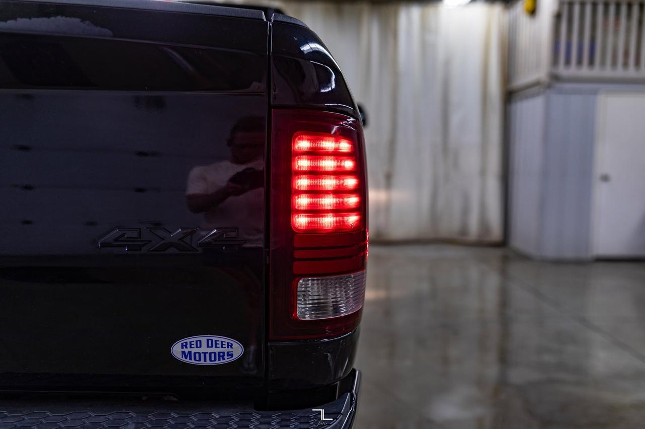 2014 Ram 2500 4x4 Crew Cab Laramie HEMI Leather Roof Nav 2&quot; Level Kit Red Deer AB