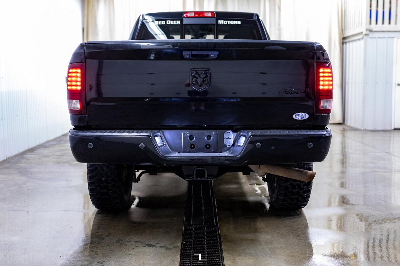 2014 Ram 2500 4x4 Crew Cab Laramie HEMI Leather Roof Nav 2&quot; Level Kit Red Deer AB
