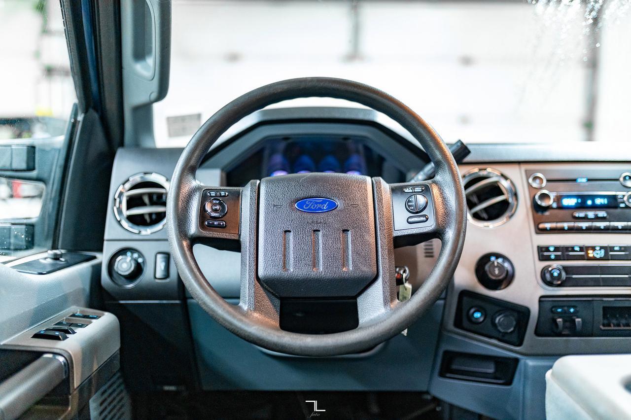 2015 Ford F-350 4x4 Crew Cab XLT Flat Deck Diesel Red Deer AB