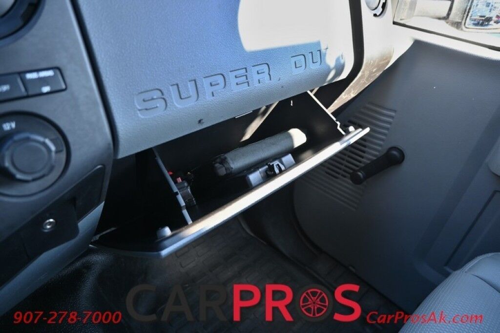 2015 Ford Super Duty F-550 XL - 6.8L V10 - 4X4 - Dually - Single Cab - 152 Stake bed w/ Waltco Power Lift System - Roughneck Storage Boxes - Tow Mirrors - Cruise Control - Air Conditioner - AUX - 1 Owner - Low Miles Anchorage AK