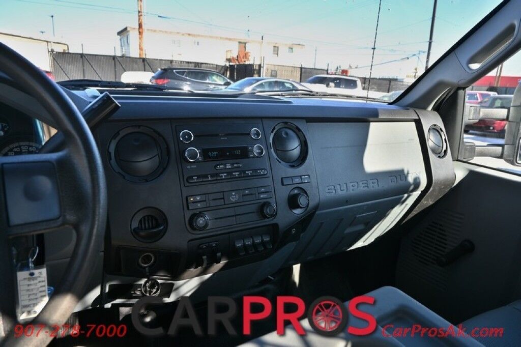 2015 Ford Super Duty F-550 XL - 6.8L V10 - 4X4 - Dually - Single Cab - 152 Stake bed w/ Waltco Power Lift System - Roughneck Storage Boxes - Tow Mirrors - Cruise Control - Air Conditioner - AUX - 1 Owner - Low Miles Anchorage AK