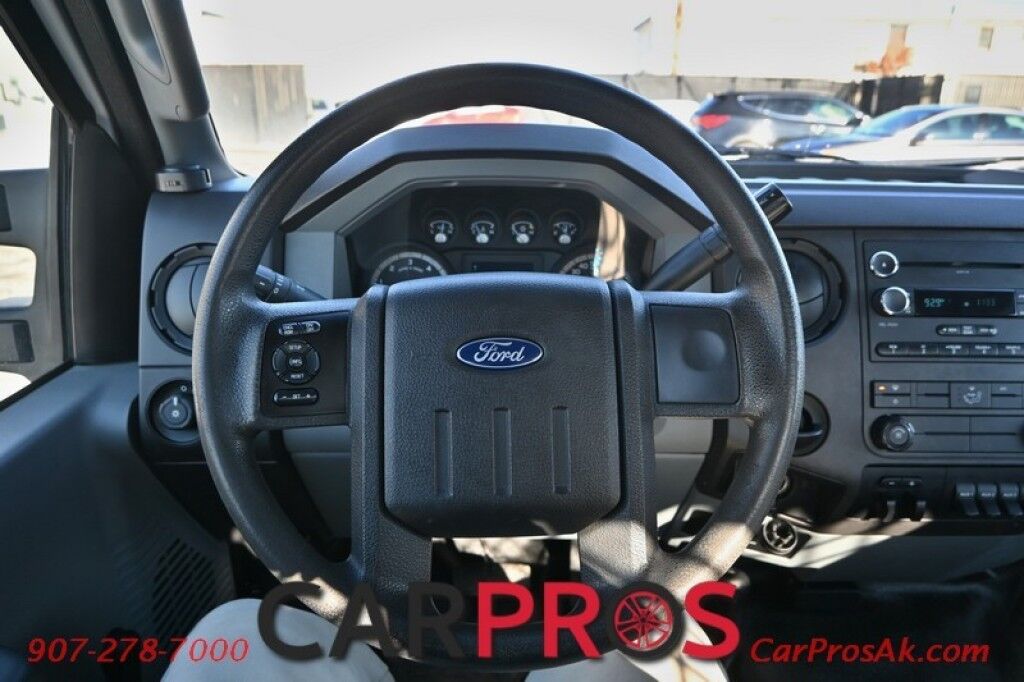 2015 Ford Super Duty F-550 XL - 6.8L V10 - 4X4 - Dually - Single Cab - 152 Stake bed w/ Waltco Power Lift System - Roughneck Storage Boxes - Tow Mirrors - Cruise Control - Air Conditioner - AUX - 1 Owner - Low Miles Anchorage AK