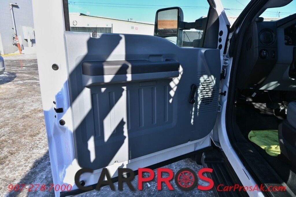 2015 Ford Super Duty F-550 XL - 6.8L V10 - 4X4 - Dually - Single Cab - 152 Stake bed w/ Waltco Power Lift System - Roughneck Storage Boxes - Tow Mirrors - Cruise Control - Air Conditioner - AUX - 1 Owner - Low Miles Anchorage AK