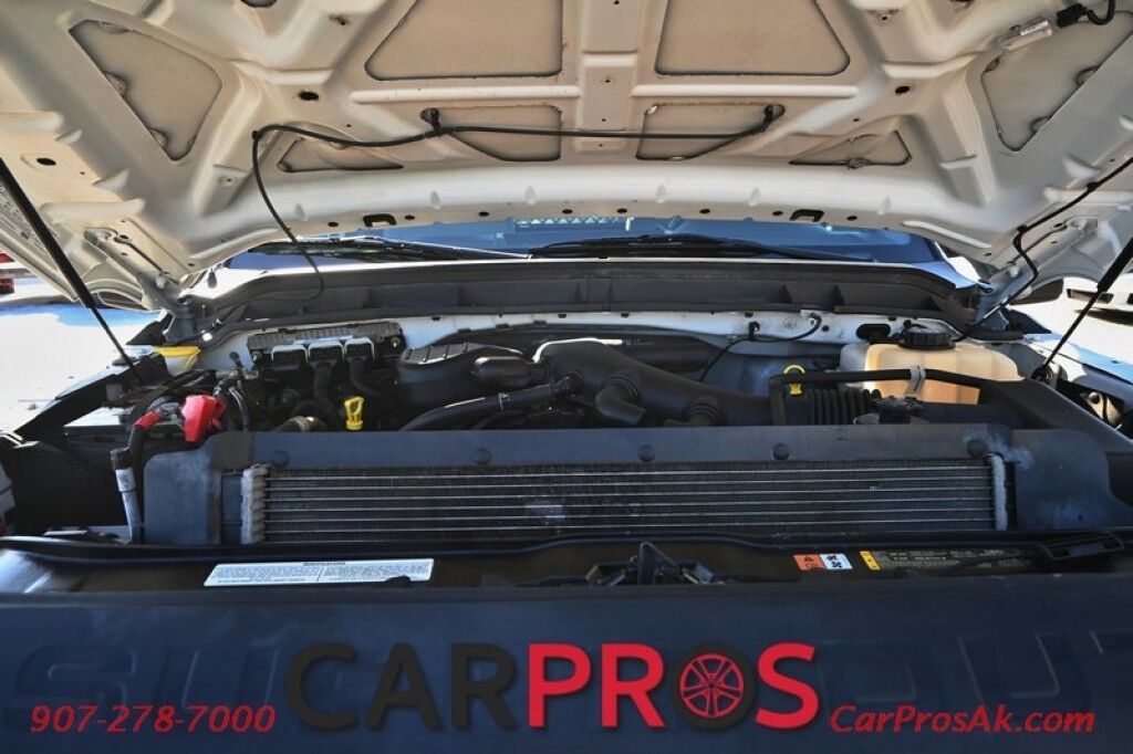 2015 Ford Super Duty F-550 XL - 6.8L V10 - 4X4 - Dually - Single Cab - 152 Stake bed w/ Waltco Power Lift System - Roughneck Storage Boxes - Tow Mirrors - Cruise Control - Air Conditioner - AUX - 1 Owner - Low Miles Anchorage AK