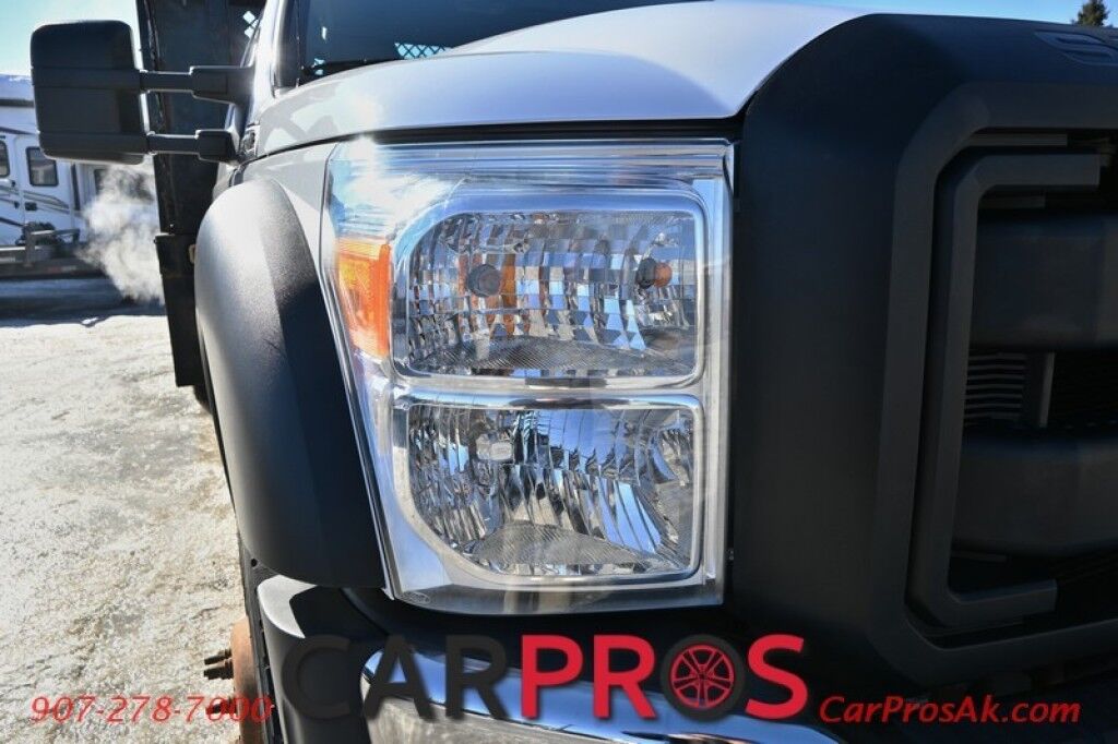 2015 Ford Super Duty F-550 XL - 6.8L V10 - 4X4 - Dually - Single Cab - 152 Stake bed w/ Waltco Power Lift System - Roughneck Storage Boxes - Tow Mirrors - Cruise Control - Air Conditioner - AUX - 1 Owner - Low Miles Anchorage AK