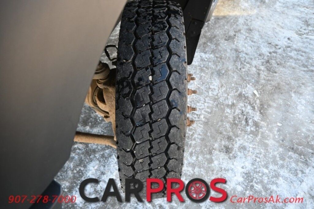 2015 Ford Super Duty F-550 XL - 6.8L V10 - 4X4 - Dually - Single Cab - 152 Stake bed w/ Waltco Power Lift System - Roughneck Storage Boxes - Tow Mirrors - Cruise Control - Air Conditioner - AUX - 1 Owner - Low Miles Anchorage AK