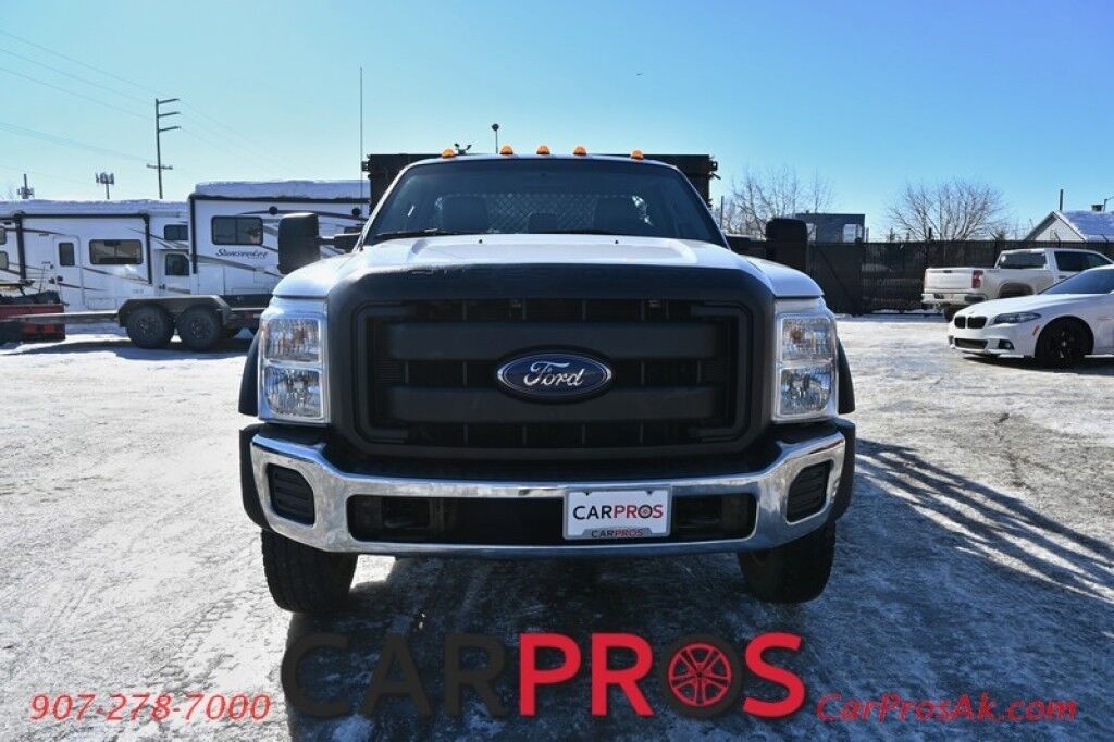 2015 Ford Super Duty F-550 XL - 6.8L V10 - 4X4 - Dually - Single Cab - 152 Stake bed w/ Waltco Power Lift System - Roughneck Storage Boxes - Tow Mirrors - Cruise Control - Air Conditioner - AUX - 1 Owner - Low Miles