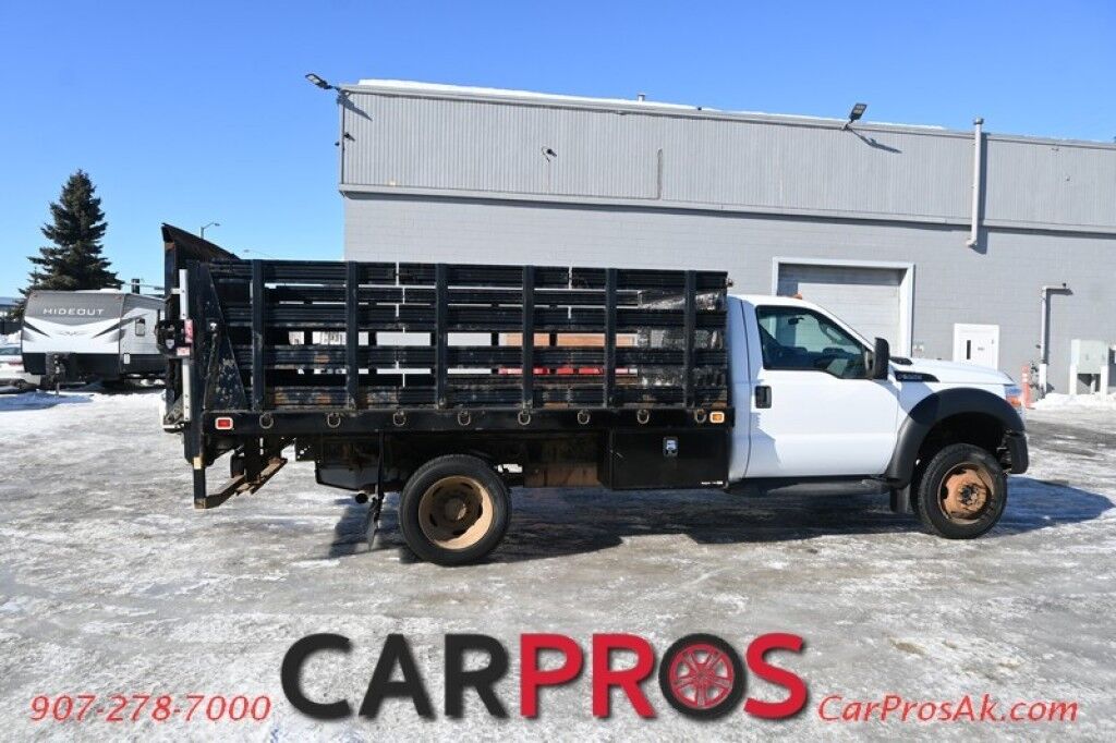 2015 Ford Super Duty F-550 XL - 6.8L V10 - 4X4 - Dually - Single Cab - 152 Stake bed w/ Waltco Power Lift System - Roughneck Storage Boxes - Tow Mirrors - Cruise Control - Air Conditioner - AUX - 1 Owner - Low Miles Anchorage AK