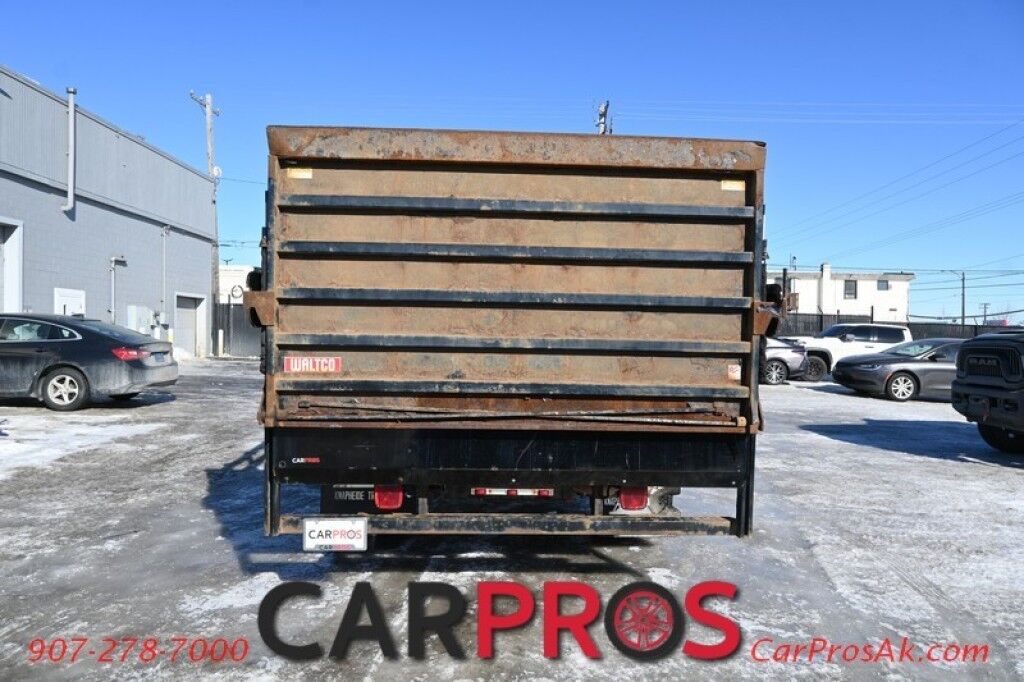 2015 Ford Super Duty F-550 XL - 6.8L V10 - 4X4 - Dually - Single Cab - 152 Stake bed w/ Waltco Power Lift System - Roughneck Storage Boxes - Tow Mirrors - Cruise Control - Air Conditioner - AUX - 1 Owner - Low Miles Anchorage AK