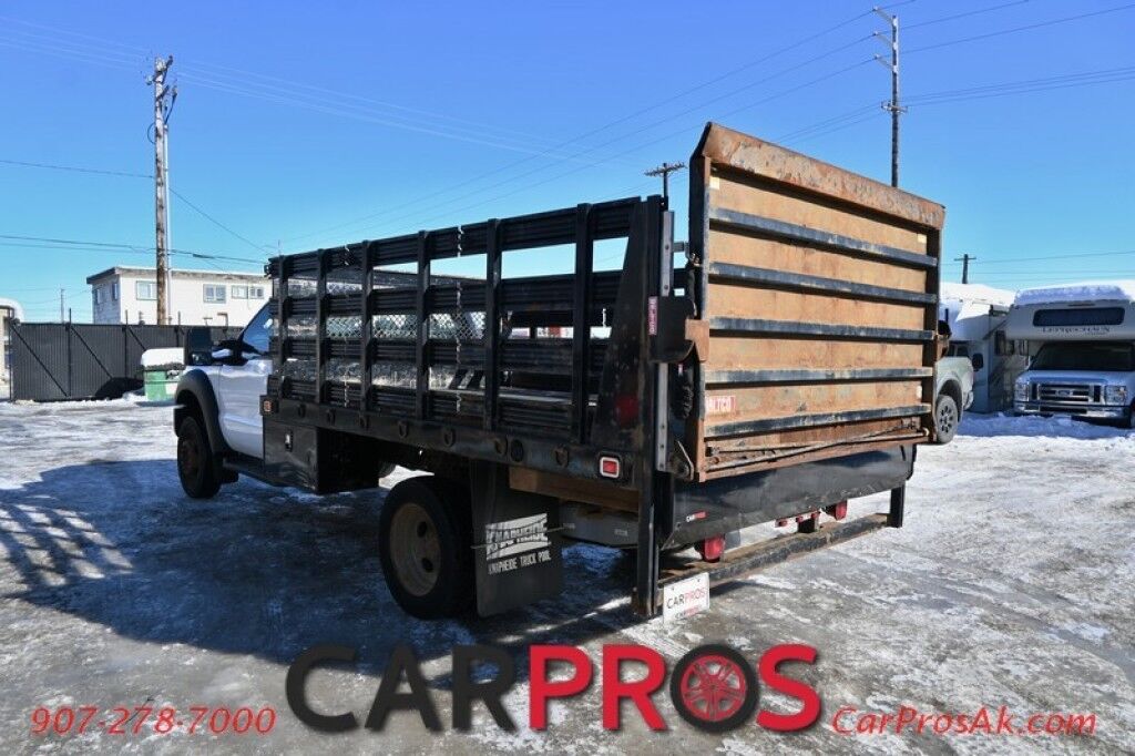 2015 Ford Super Duty F-550 XL - 6.8L V10 - 4X4 - Dually - Single Cab - 152 Stake bed w/ Waltco Power Lift System - Roughneck Storage Boxes - Tow Mirrors - Cruise Control - Air Conditioner - AUX - 1 Owner - Low Miles Anchorage AK