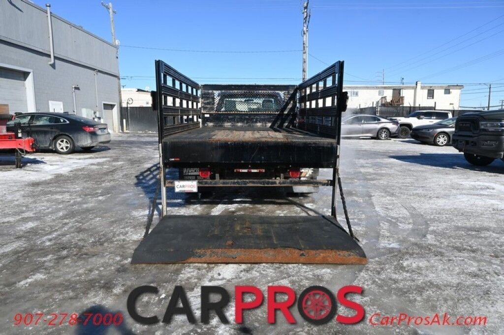 2015 Ford Super Duty F-550 XL - 6.8L V10 - 4X4 - Dually - Single Cab - 152 Stake bed w/ Waltco Power Lift System - Roughneck Storage Boxes - Tow Mirrors - Cruise Control - Air Conditioner - AUX - 1 Owner - Low Miles Anchorage AK