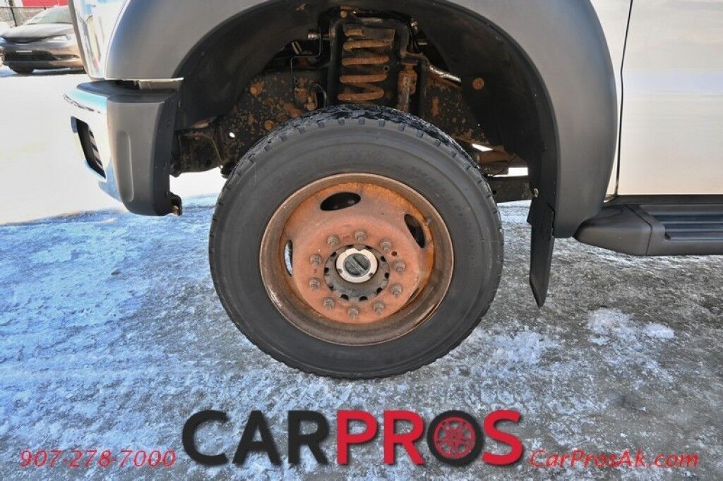 2015 Ford Super Duty F-550 XL - 6.8L V10 - 4X4 - Dually - Single Cab - 152 Stake bed w/ Waltco Power Lift System - Roughneck Storage Boxes - Tow Mirrors - Cruise Control - Air Conditioner - AUX - 1 Owner - Low Miles Anchorage AK