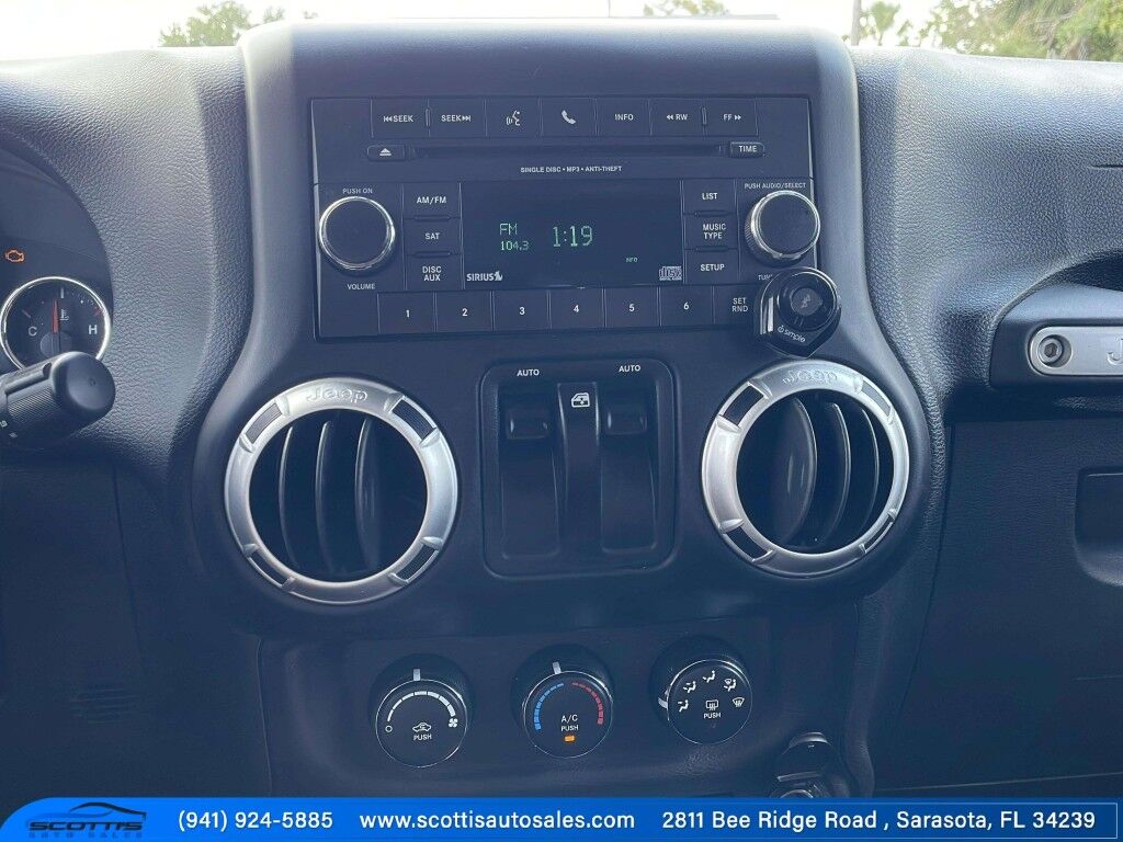 2015 Jeep Wrangler Freedom Edition~CLEAN CARFAX~LOCAL TRADE IN~FUN IN THE SUN~GREAT BEACH VEHICLE~ONLINE FINANCE AND SHIPPING AVAILABLE Sarasota FL