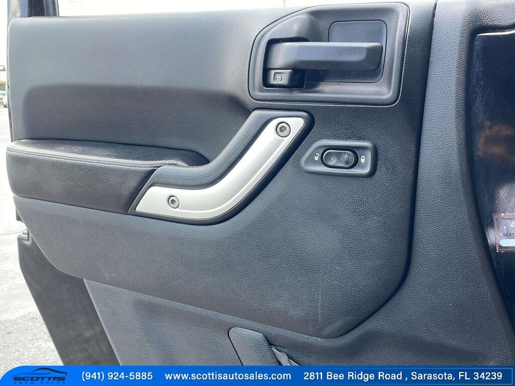 2015 Jeep Wrangler Freedom Edition~CLEAN CARFAX~LOCAL TRADE IN~FUN IN THE SUN~GREAT BEACH VEHICLE~ONLINE FINANCE AND SHIPPING AVAILABLE Sarasota FL