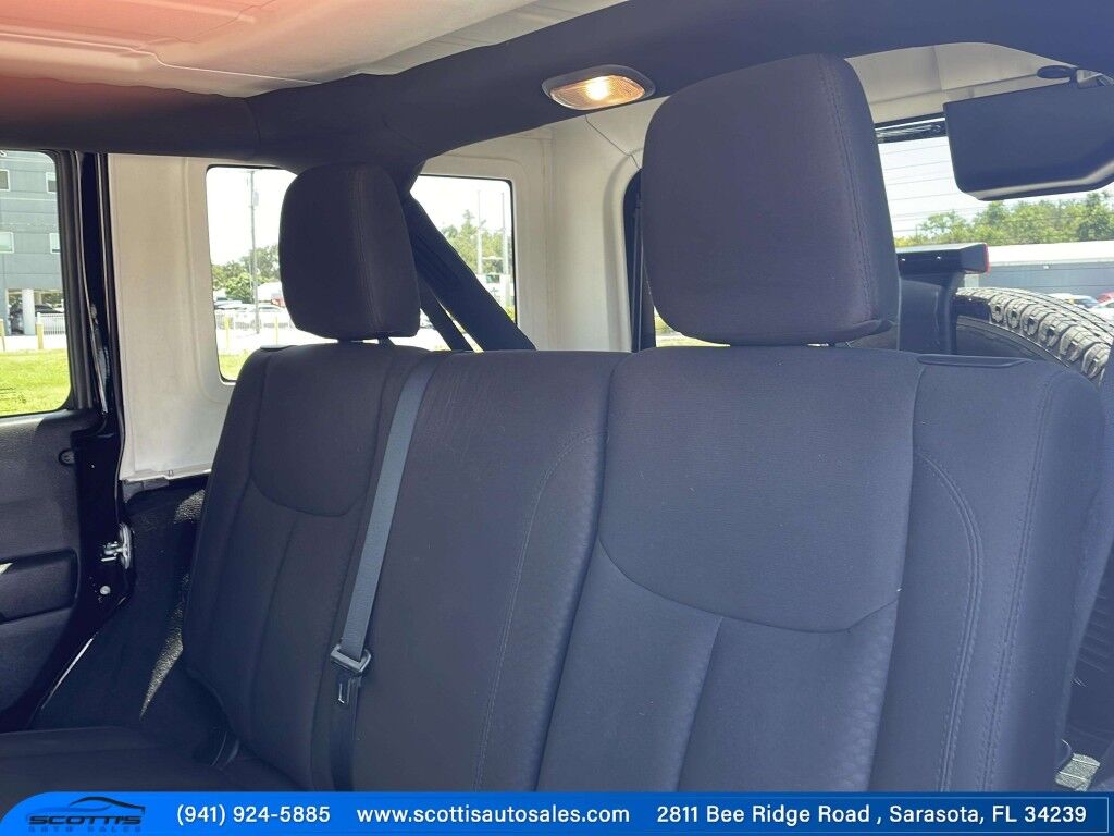 2015 Jeep Wrangler Unlimited Freedom Edition~4X4~ANTI-THEFT SYSTEM~CRASH SENSORS~CRUISE CONTRO;~LIMITED SLIP DIFFERENTIAL~PREMIUM SOUND SYSTEM~REMOVABLE ROOF~RUNNING BOARDS~TOW HOOKS~TRAILER WIRING Sarasota FL