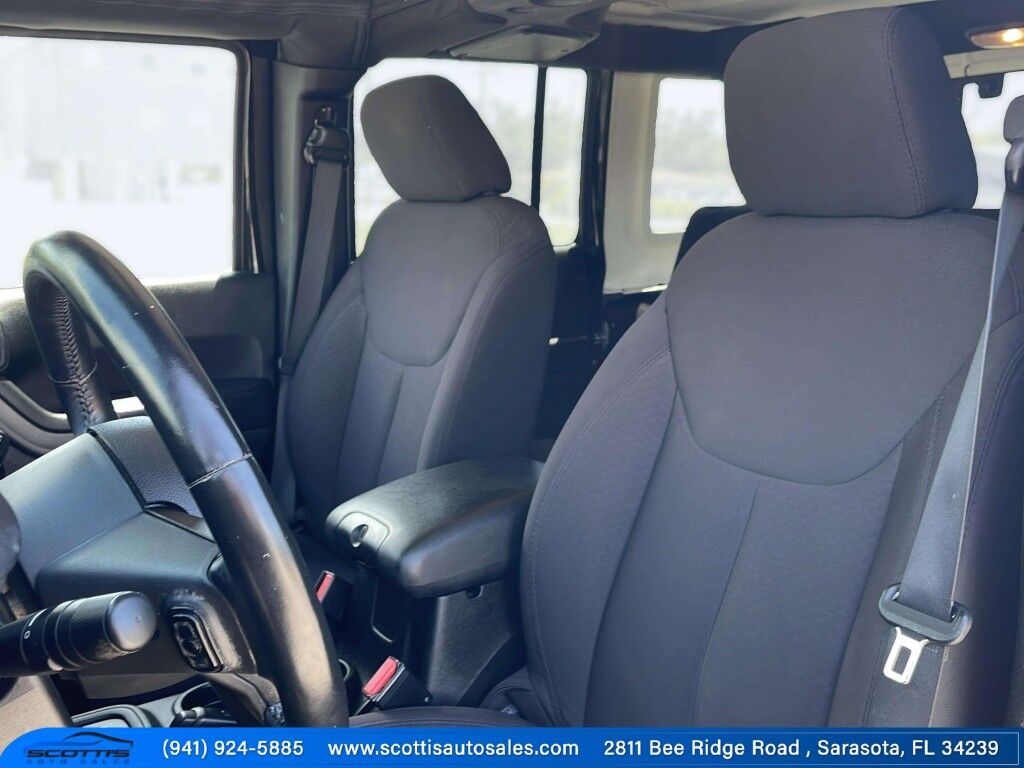 2015 Jeep Wrangler Unlimited Freedom Edition~4X4~ANTI-THEFT SYSTEM~CRASH SENSORS~CRUISE CONTRO;~LIMITED SLIP DIFFERENTIAL~PREMIUM SOUND SYSTEM~REMOVABLE ROOF~RUNNING BOARDS~TOW HOOKS~TRAILER WIRING Sarasota FL