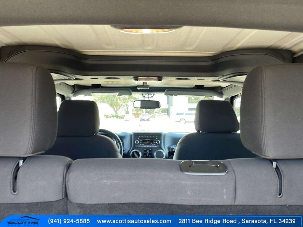 2015 Jeep Wrangler Unlimited Freedom Edition~4X4~ANTI-THEFT SYSTEM~CRASH SENSORS~CRUISE CONTRO;~LIMITED SLIP DIFFERENTIAL~PREMIUM SOUND SYSTEM~REMOVABLE ROOF~RUNNING BOARDS~TOW HOOKS~TRAILER WIRING Sarasota FL