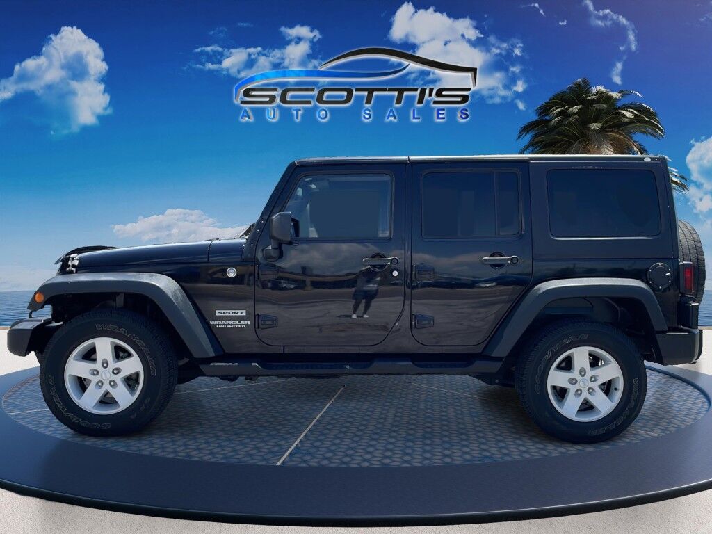 2015 Jeep Wrangler Unlimited Freedom Edition~4X4~ANTI-THEFT SYSTEM~CRASH SENSORS~CRUISE CONTRO;~LIMITED SLIP DIFFERENTIAL~PREMIUM SOUND SYSTEM~REMOVABLE ROOF~RUNNING BOARDS~TOW HOOKS~TRAILER WIRING Sarasota FL
