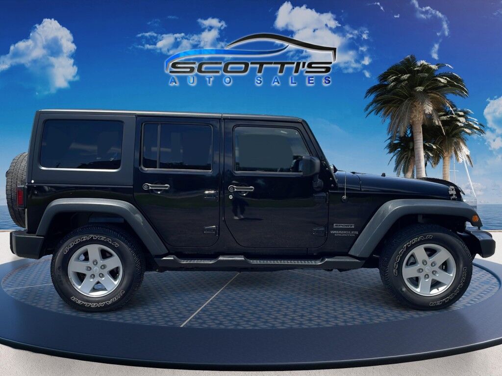 2015 Jeep Wrangler Unlimited Freedom Edition~4X4~ANTI-THEFT SYSTEM~CRASH SENSORS~CRUISE CONTRO;~LIMITED SLIP DIFFERENTIAL~PREMIUM SOUND SYSTEM~REMOVABLE ROOF~RUNNING BOARDS~TOW HOOKS~TRAILER WIRING Sarasota FL